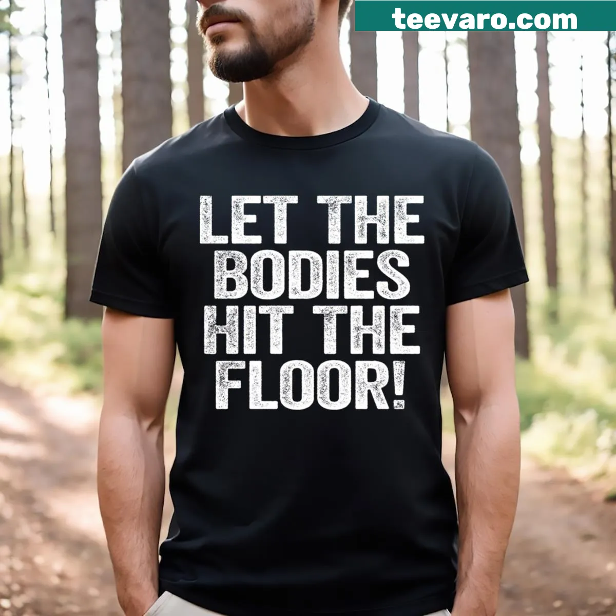 Bold typography T-shirt with the phrase 'Let The Bodies Hit The Floor' — on a men's t-shirt