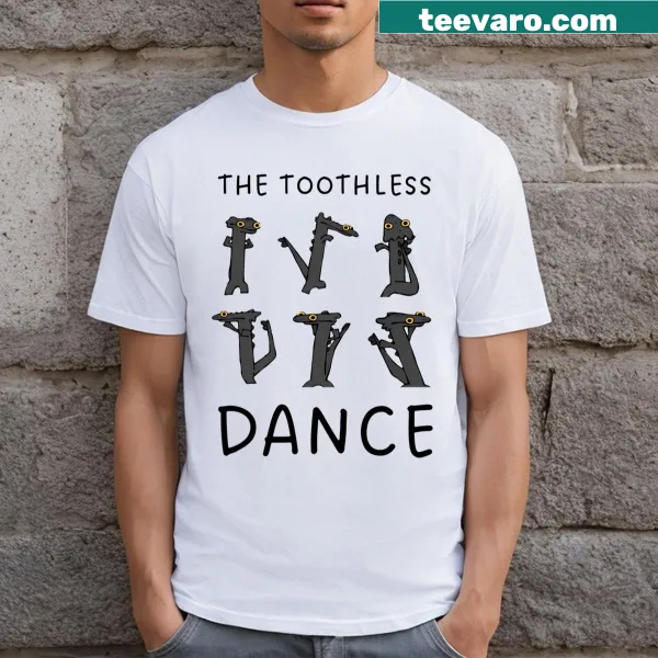 Cartoon T-shirt featuring a dancing Toothless dragon from How to Train Your Dragon.