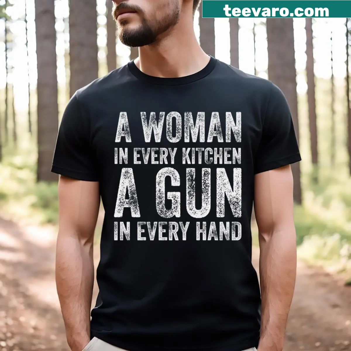 Bold typography T-shirt with 'A Woman In Every Kitchen A Gun In Every Hand' — on a men's t-shirt