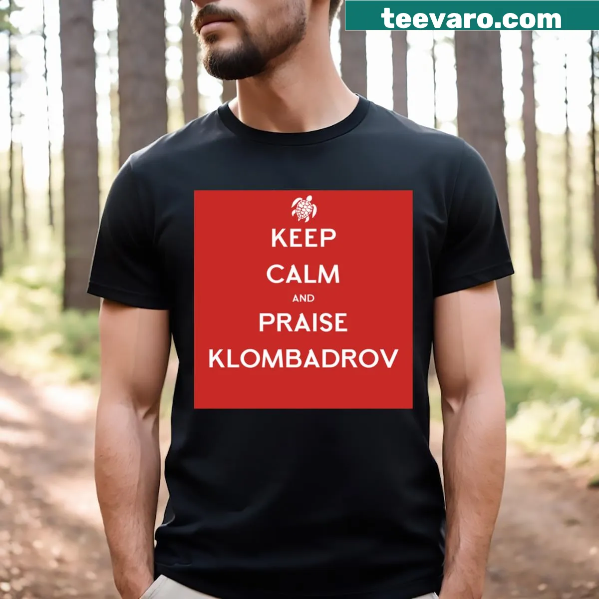 T-shirt featuring a bold graphic of Klombadrov — on a men's t-shirt