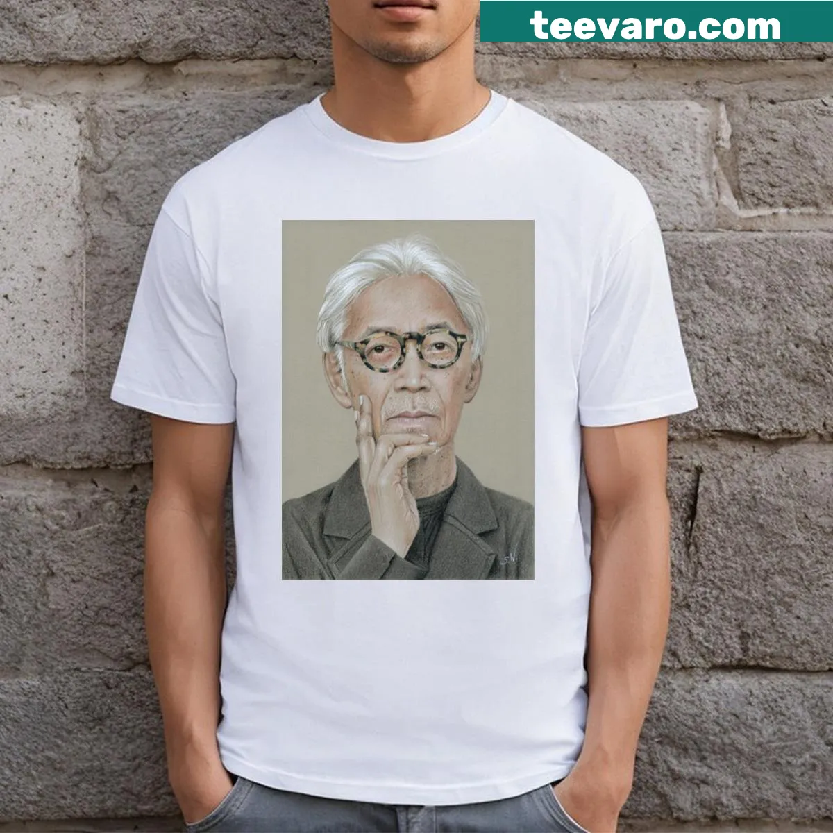 T-shirt featuring an artistic graphic of Ryuichi Sakamoto — on a men's t-shirt
