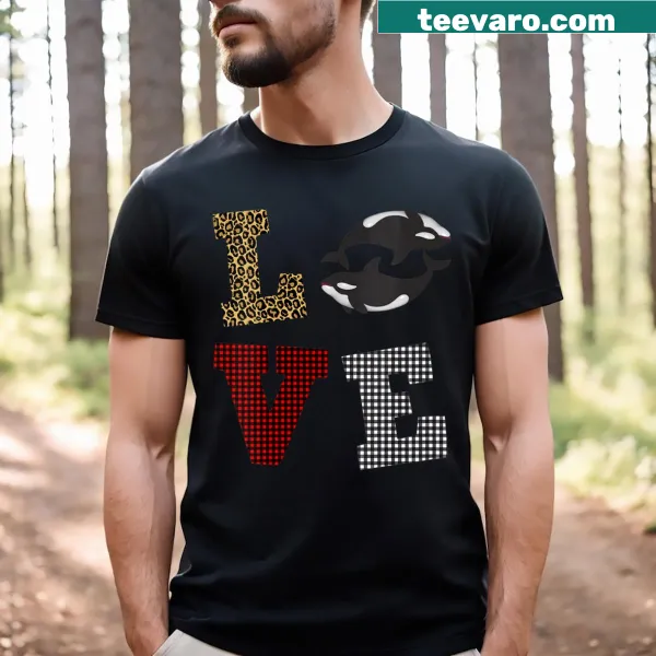 Cute killer whale graphic with hearts on a kids' Valentine's V-neck shirt