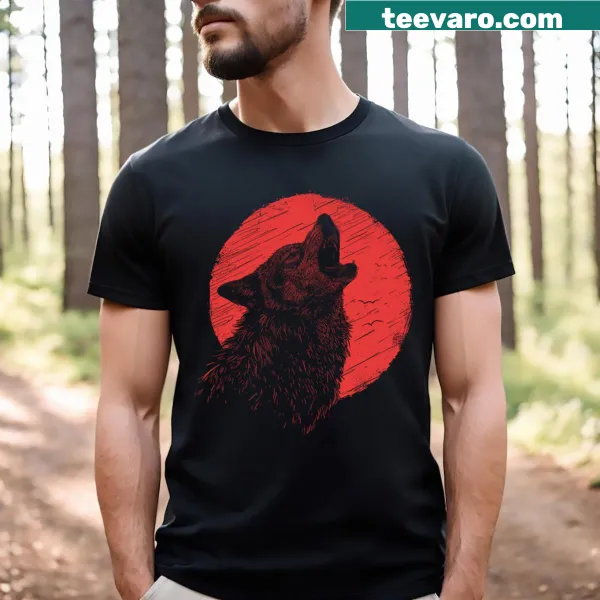 Silhouette of a howling wolf against a full moon on a T-shirt