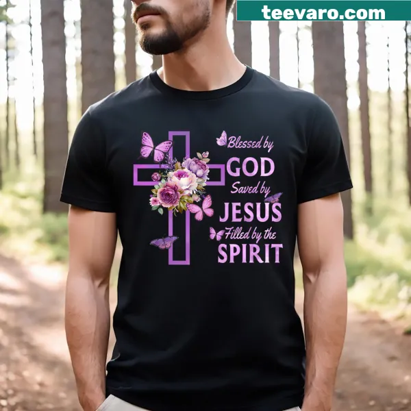 Christian T-shirt featuring floral cross design and 'Blessed By God Saved By Jesus' text