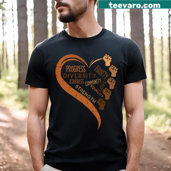 T-shirt featuring raised fists and the word 'Melanin' in bold letters.