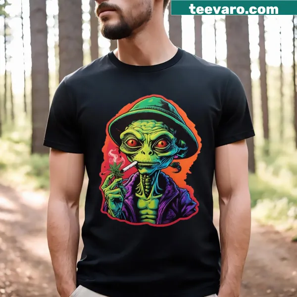 Cartoon alien surrounded by herbs on a T-shirt.