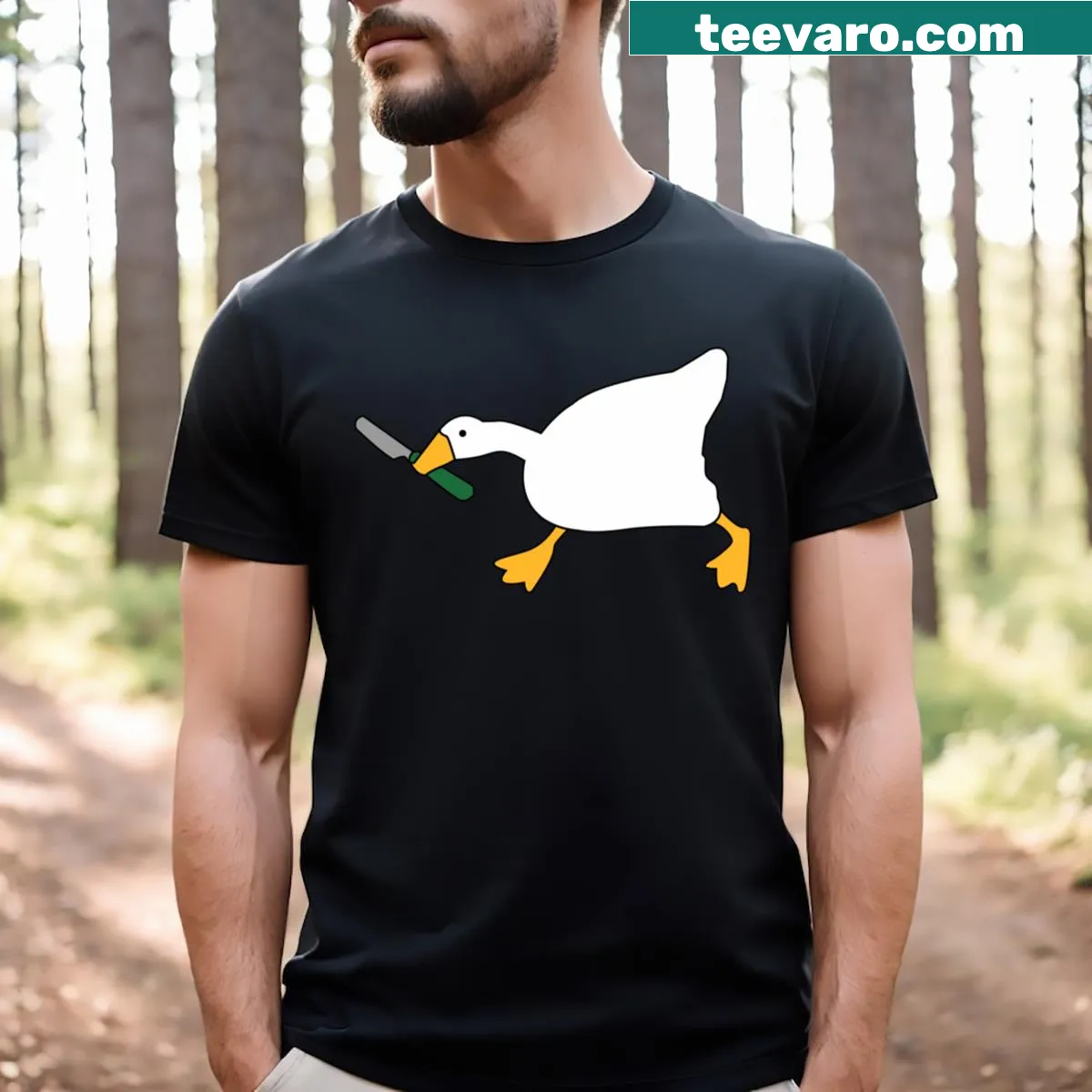Graphic of a goose holding a knife from Untitled Goose Game — on a men's t-shirt