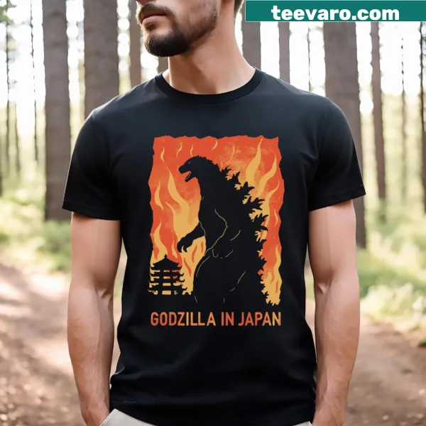 T-shirt featuring an illustration of Godzilla on fire