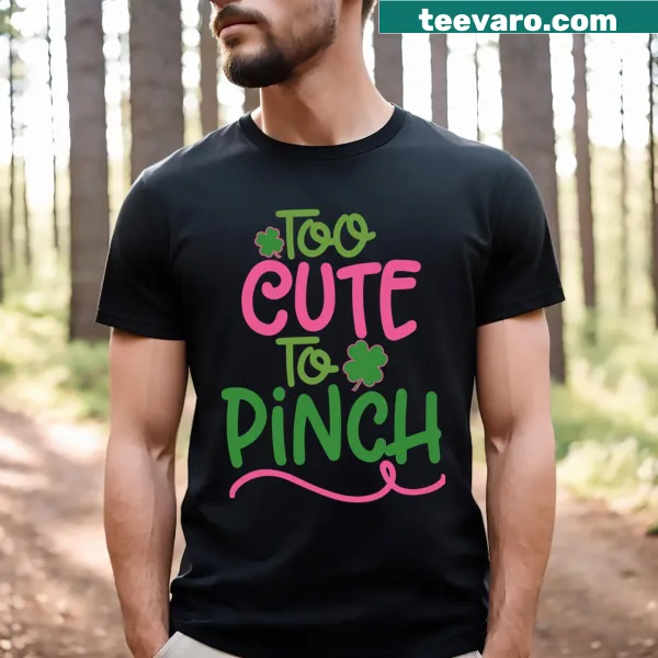 Cute graphic tee stating 'Too Cute To Pinch' for St. Patrick's Day