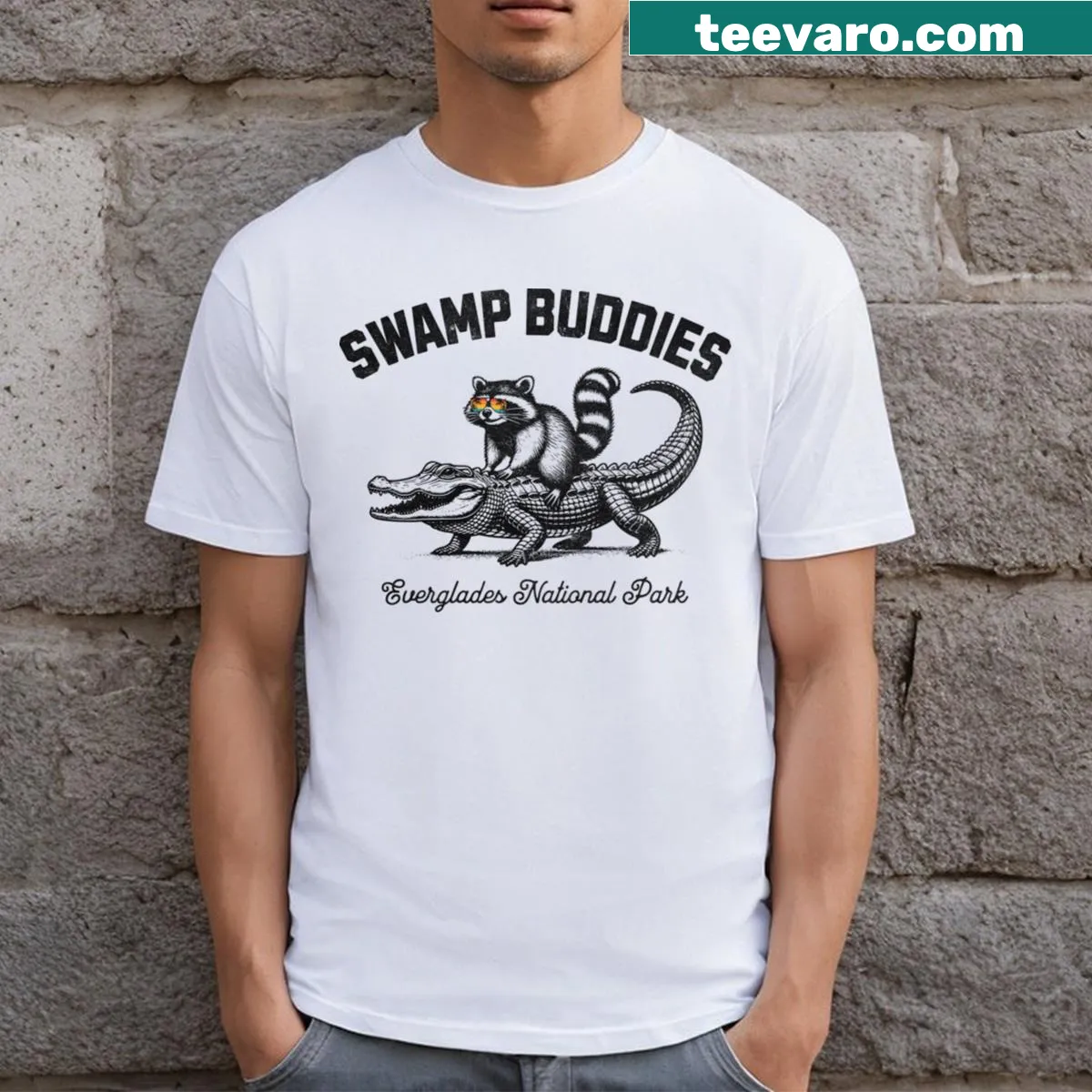 Raccoon and alligator graphic T-shirt — on a men's t-shirt