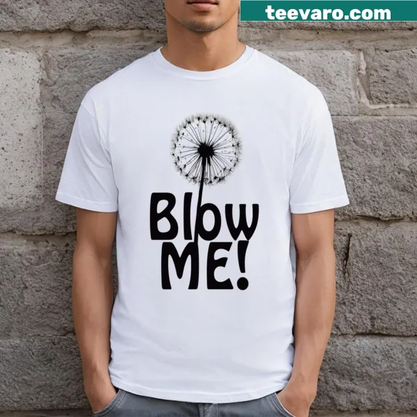 Whimsical dandelion graphic with 'Blow Me Away' text on a T-shirt