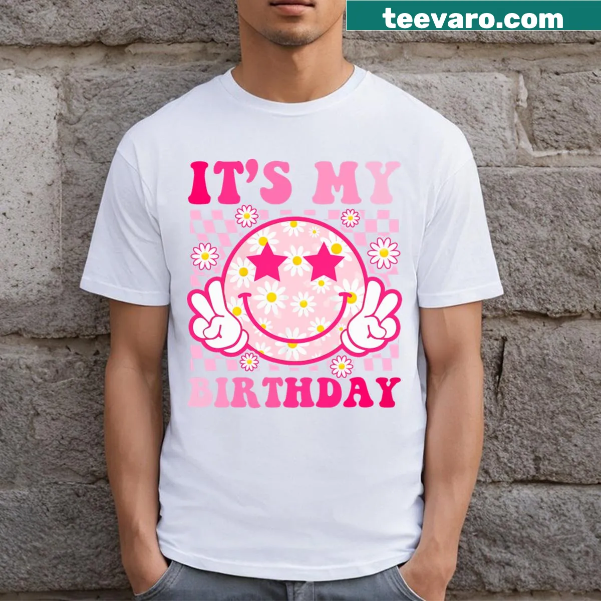 Playful pink birthday T-shirt with smiley face graphic — on a men's t-shirt