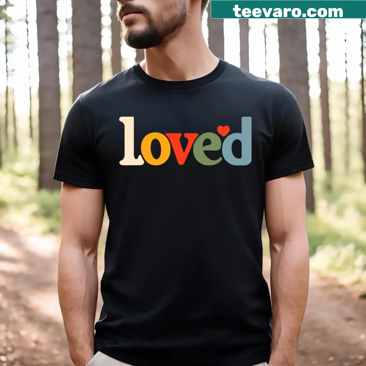 Matching couples T-shirts with Loved text and red heart design — on a men's t-shirt