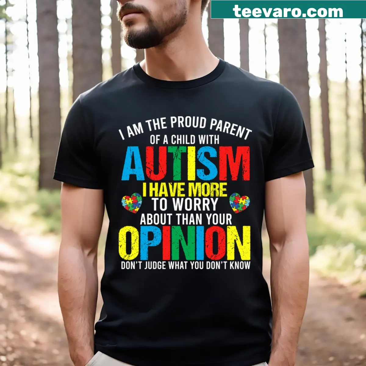 Text declaring pride in parenting a child with autism — on a men's t-shirt