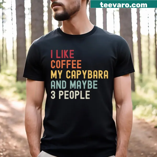 Whimsical text design of a capybara and coffee on a t-shirt.