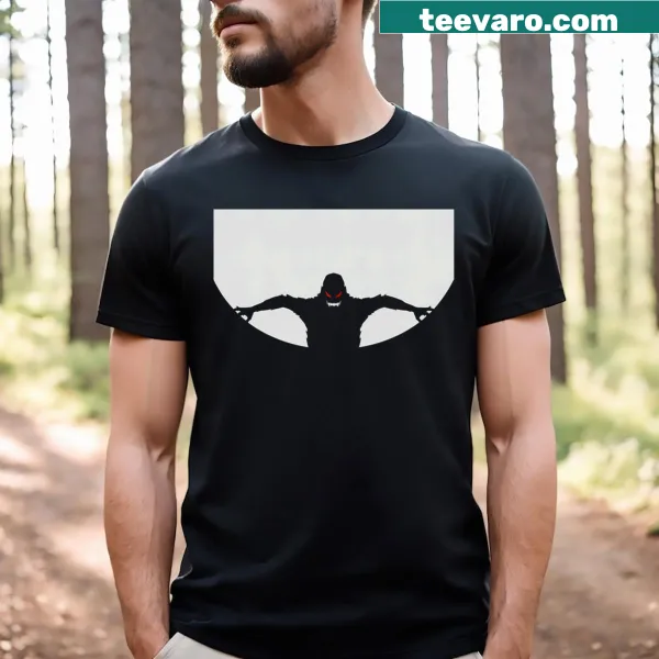 Minimalistic monster silhouette with glowing eyes on t-shirt
