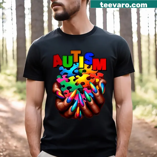 T-shirt featuring a hand and puzzle piece symbolizing autism awareness