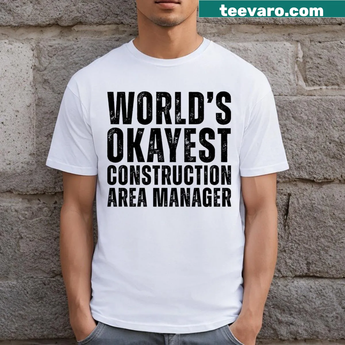 Funny World's Okayest Construction Area Manager t-shirt with bold text — on a men's t-shirt