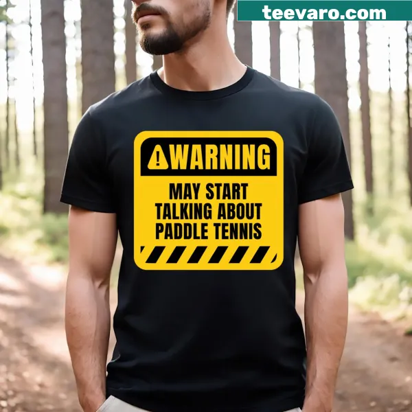 T-shirt with the phrase 'Paddle Tennis Warning' featured prominently