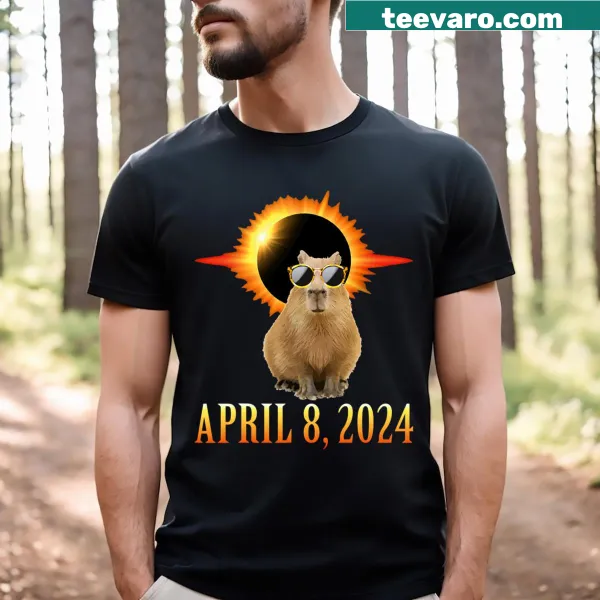 Capybara wearing sunglasses on a solar eclipse T-shirt