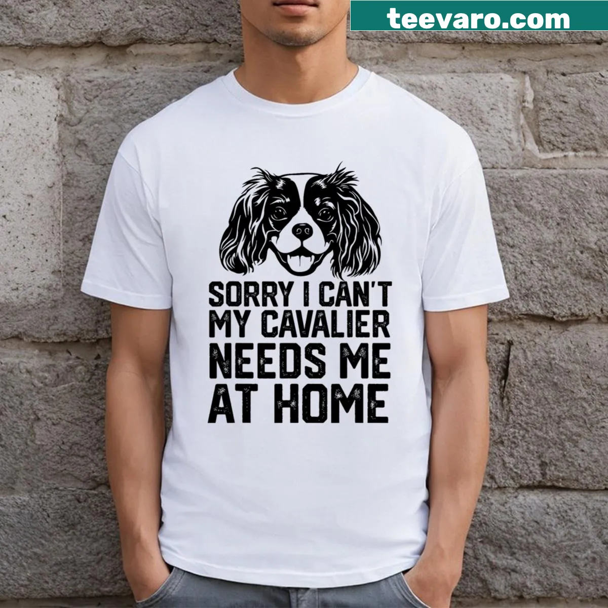 Humorous T-shirt stating 'Sorry I Can't My Cavalier Needs Me At Home' — on a men's t-shirt