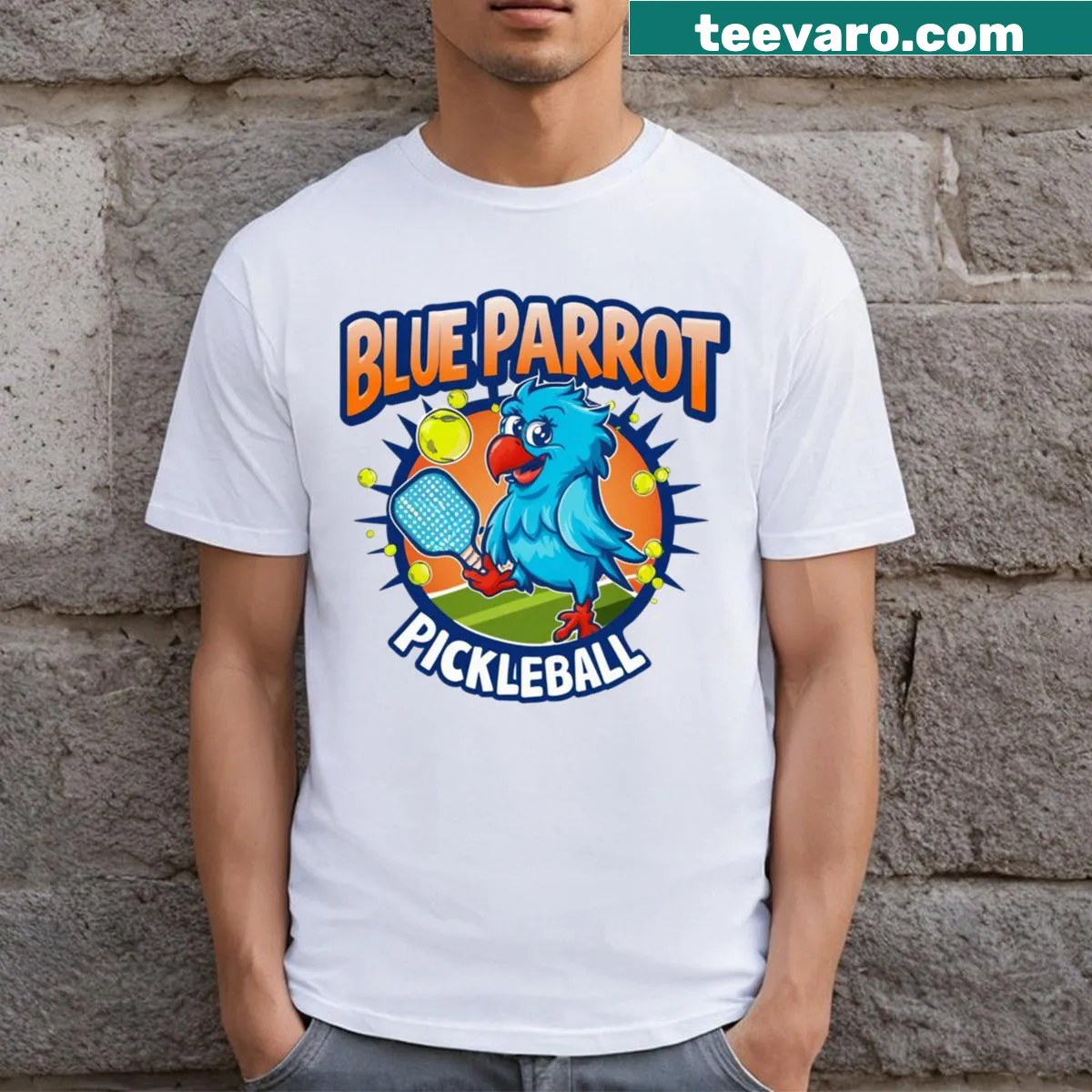 Sporty T-shirt featuring a blue parrot and pickleball theme — on a men's t-shirt