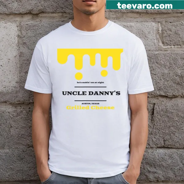 Graphic shirt celebrating grilled cheese with playful text.