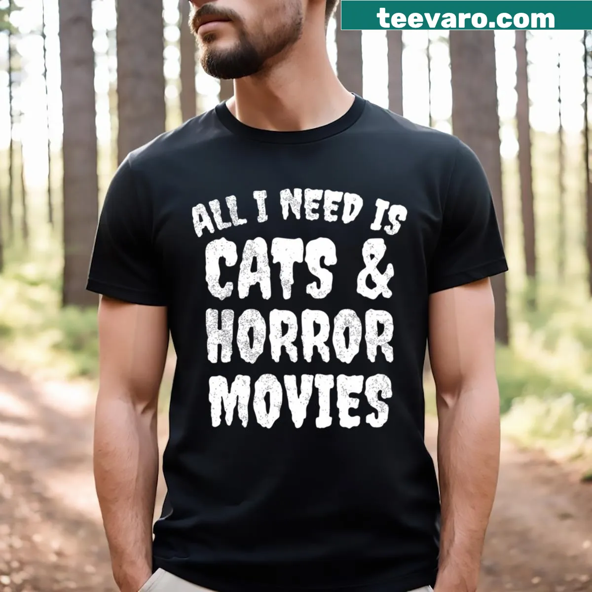 T-shirt featuring playful quote about cats and horror movies — on a men's t-shirt