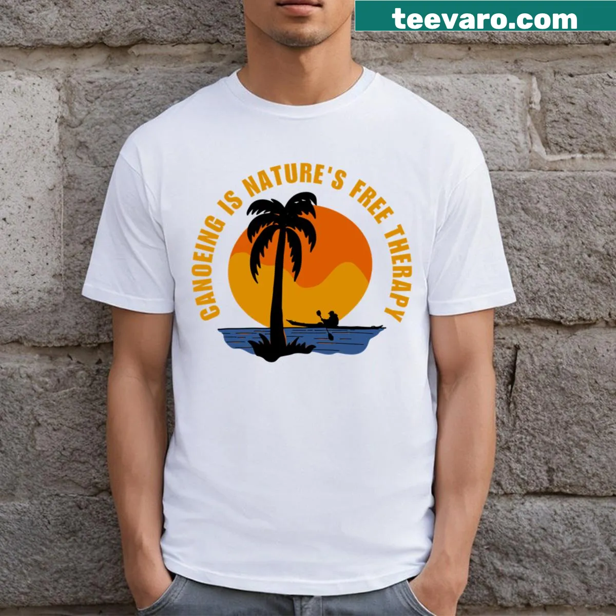Vintage canoeing t-shirt with the phrase 'Canoeing Is Nature's Free Therapy' — on a men's t-shirt