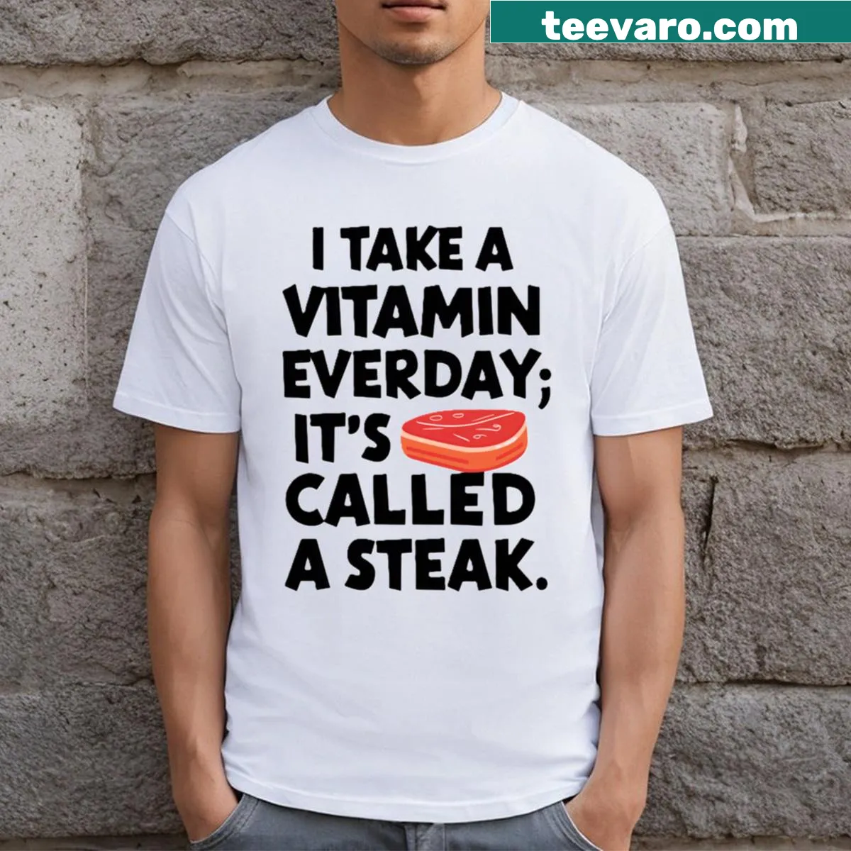 Humorous steak vitamin shirt with playful typography design — on a men's t-shirt