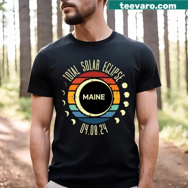 Vintage-style T-shirt celebrating the total solar eclipse in Maine with nostalgic graphics.