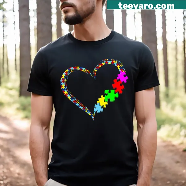Heart and puzzle piece graphic for autism awareness on a T-shirt