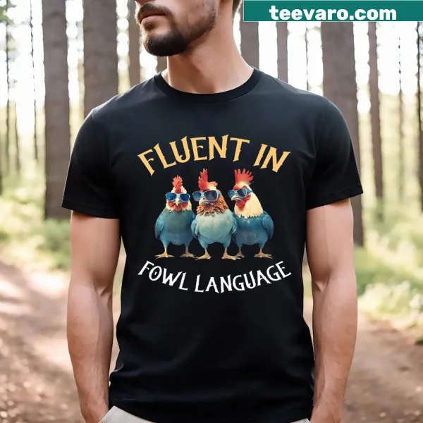 Text 'Fluent In Fowl Language' on a chicken-themed T-shirt