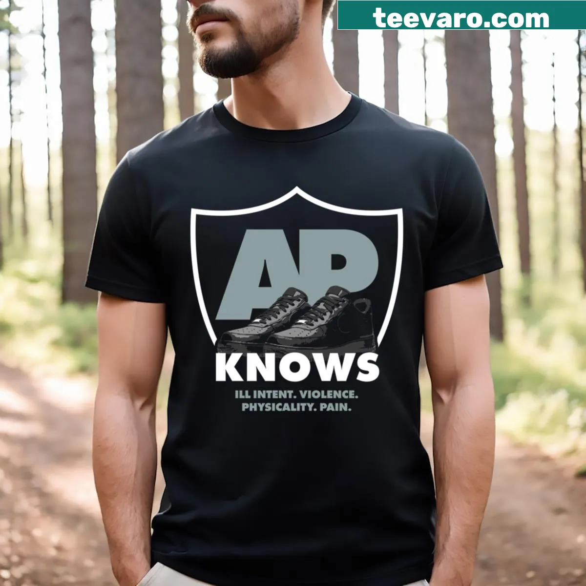 Raiders shield graphic on a sports-themed T-shirt — on a men's t-shirt