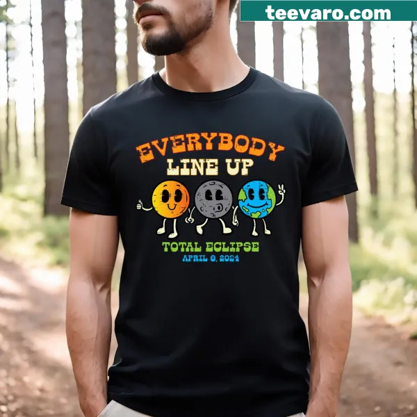 Illustrative t-shirt showing sun, moon, and Earth alignment for the solar eclipse.