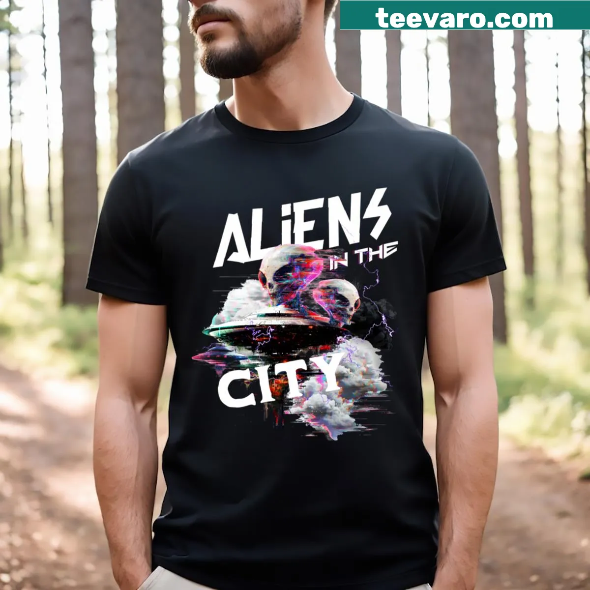 Playful t-shirt featuring an alien exploring a city scene. — on a men's t-shirt