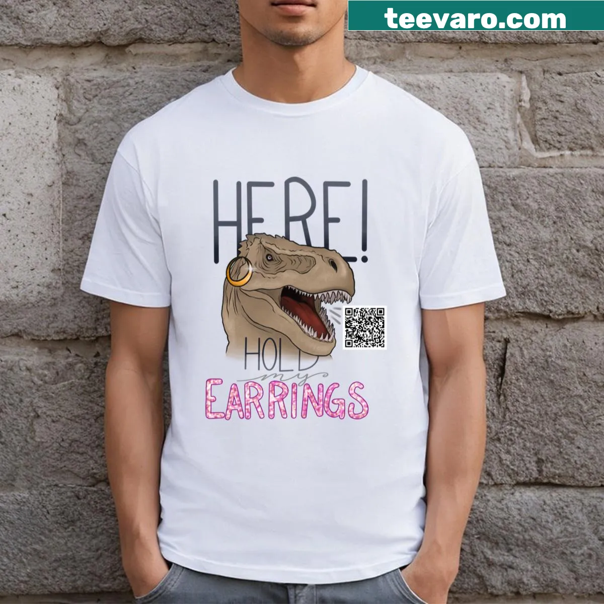 Playful t-shirt with the text 'Here! Hold My Earrings' — on a men's t-shirt