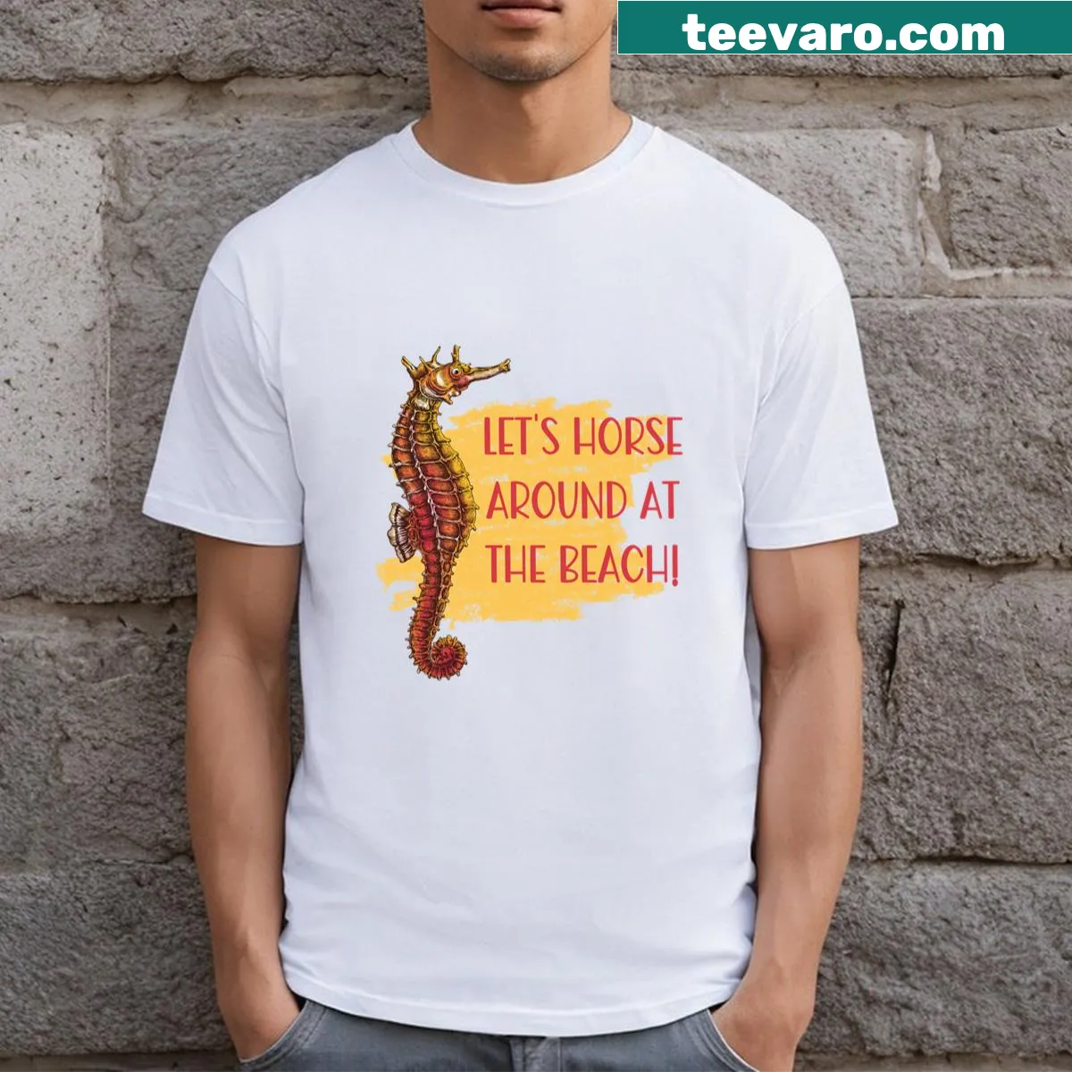 T-shirt featuring the text 'Let's Horse Around At The Beach!' with whimsical beach illustrations — on a men's t-shirt