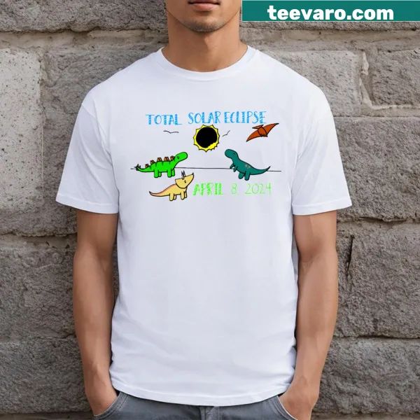 T-shirt featuring dinosaurs watching a total solar eclipse