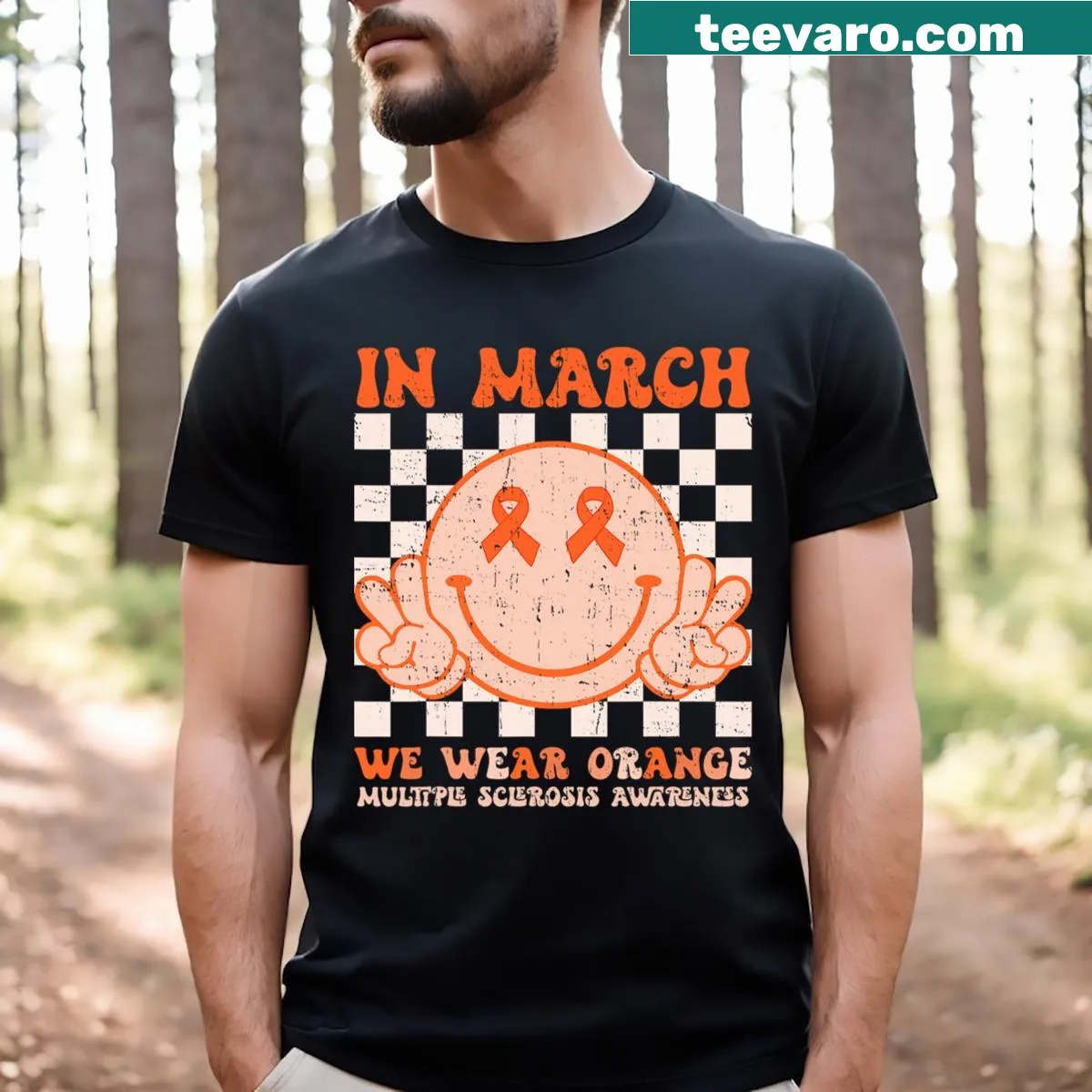 T-shirt with a smiley face and the phrase 'In March We Wear Orange' supporting MS awareness. — on a men's t-shirt
