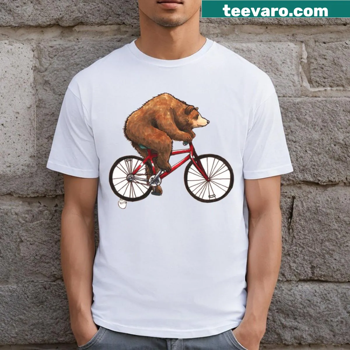 T-shirt featuring a bear riding a bike in a fun design — on a men's t-shirt