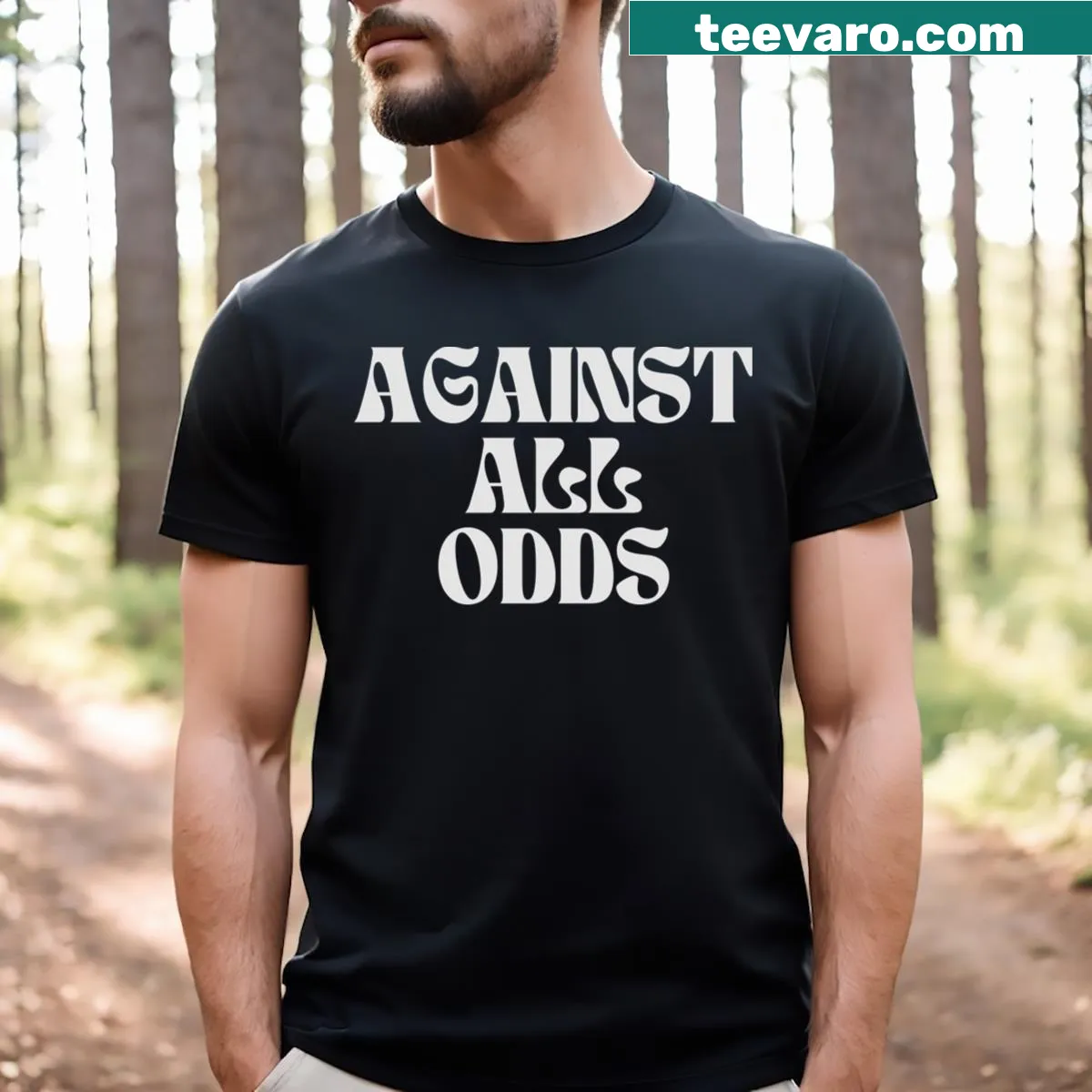 Typography T-shirt featuring the phrase Against All Odds in bold letters — on a men's t-shirt
