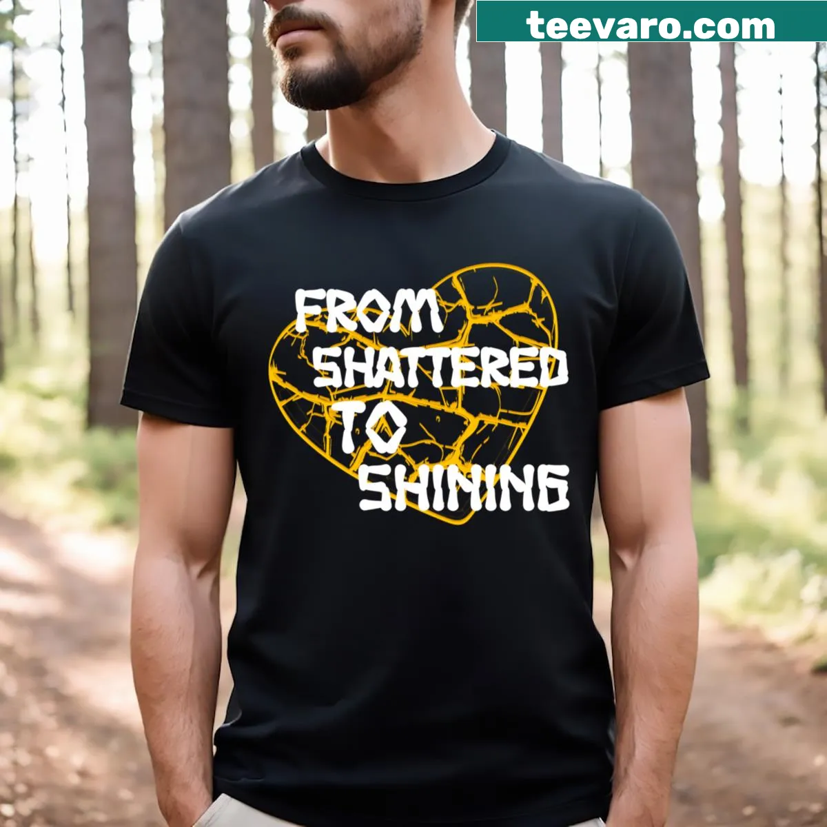 T-shirt featuring a gold heart and the phrase 'From Shattered To Shining' in a stylish design. — on a men's t-shirt