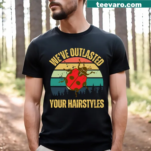Retro sunset graphic with ladybugs on a T-shirt