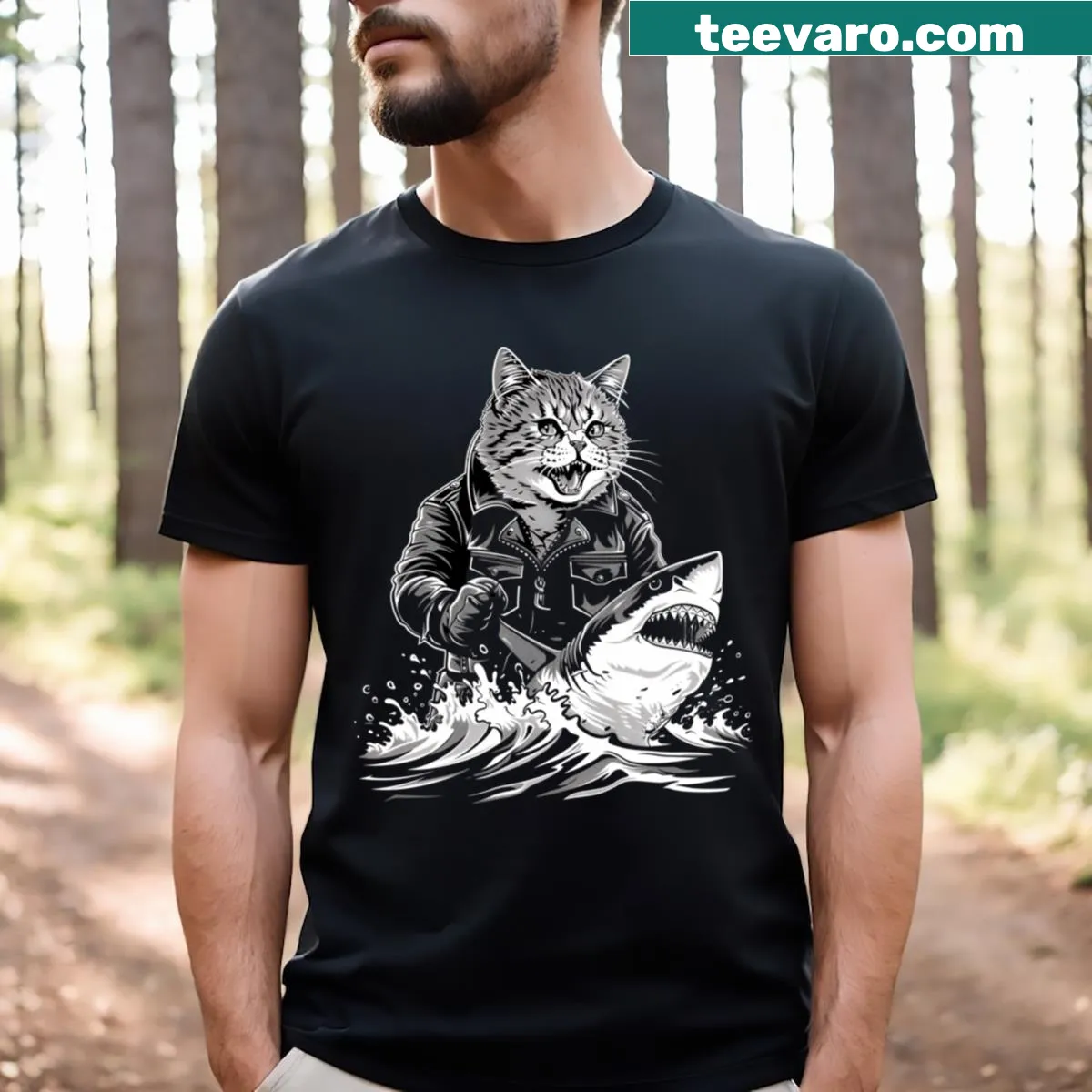 Playful t-shirt with cat riding a shark graphic — on a men's t-shirt