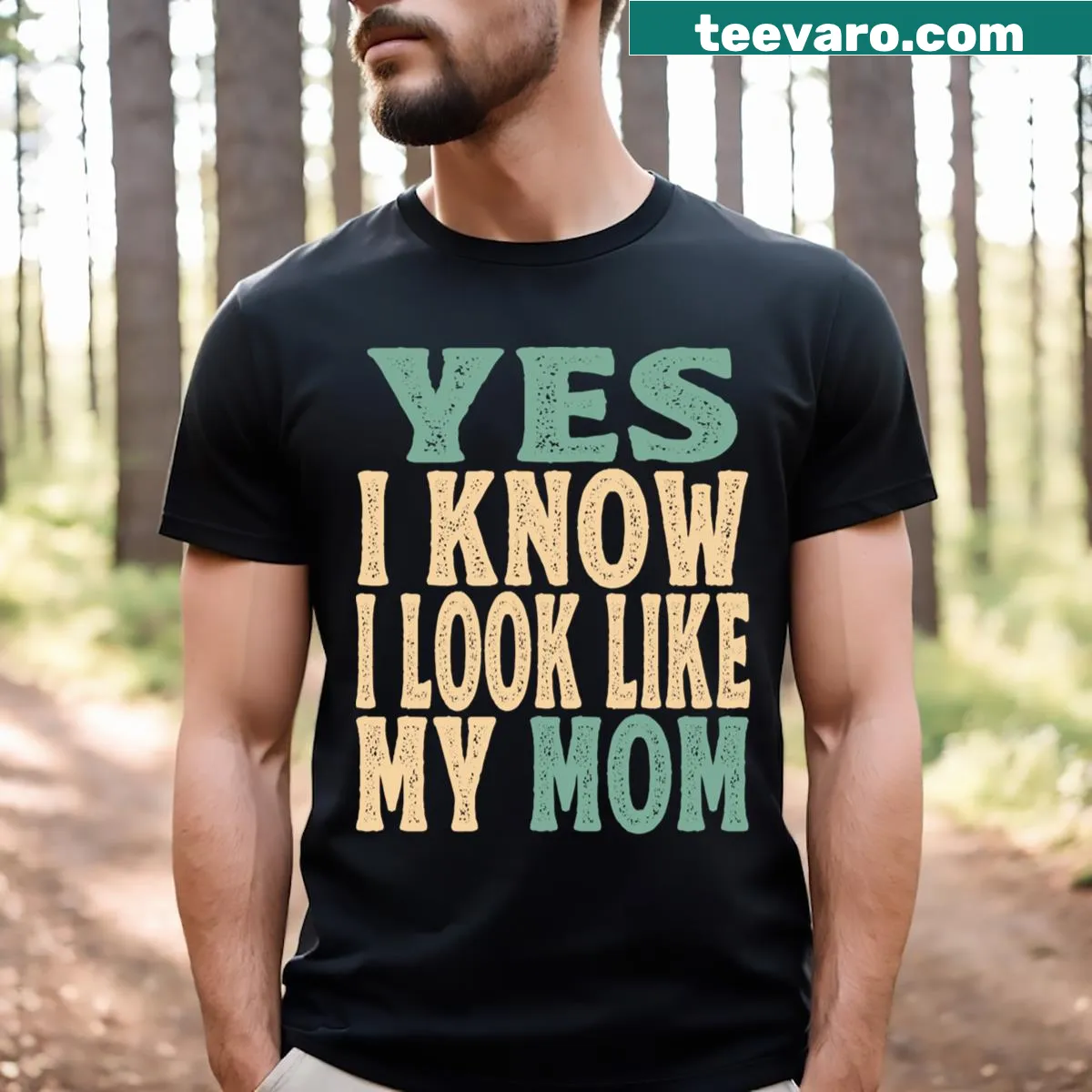 Typography t-shirt featuring the phrase 'Yes I Know I Look Like My Mom' — on a men's t-shirt