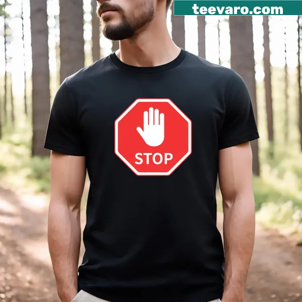 T-shirt featuring a stop sign graphic with a hand illustration in red