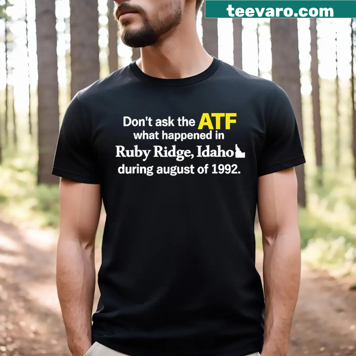 Edgy t-shirt with text about Ruby Ridge, Idaho — on a men's t-shirt