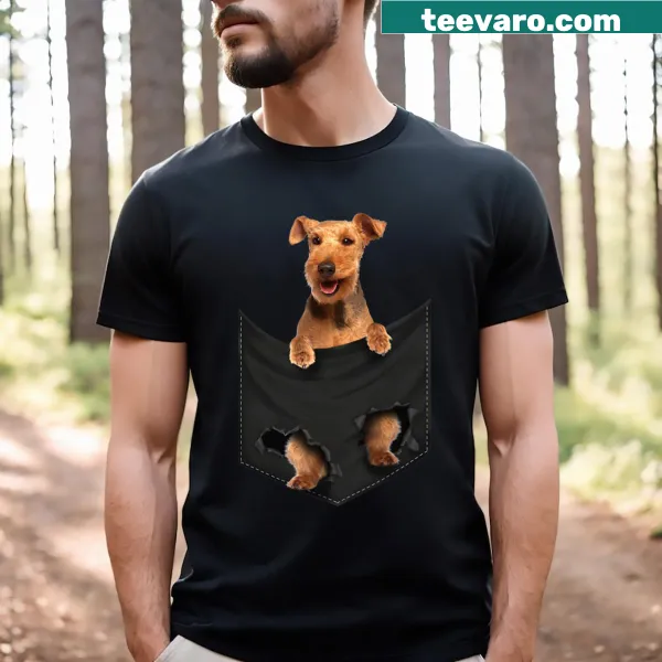 Illustration of a Welsh Terrier peeking out of a pocket on a t-shirt