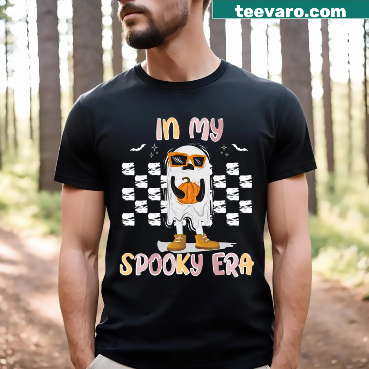 Halloween-themed shirt with illustrations of ghosts, pumpkins, and witches — on a men's t-shirt